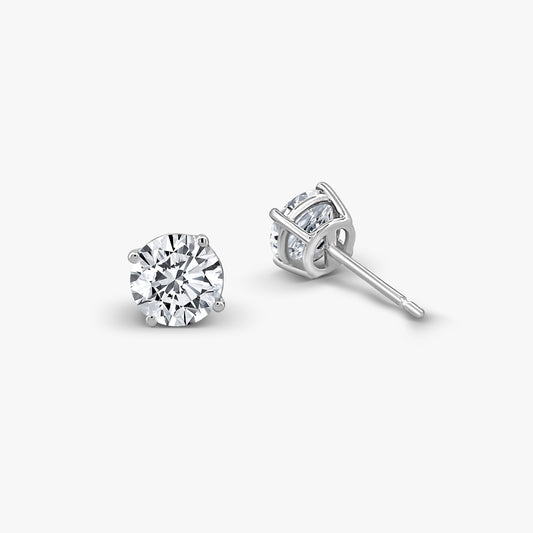 Round Brilliant Solitaire Studs Earrings in Four Prong Basket Setting